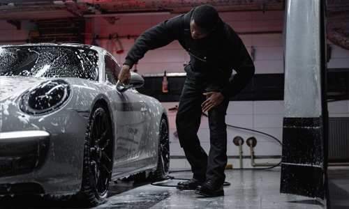 A White Porsche Getting Cleaned
